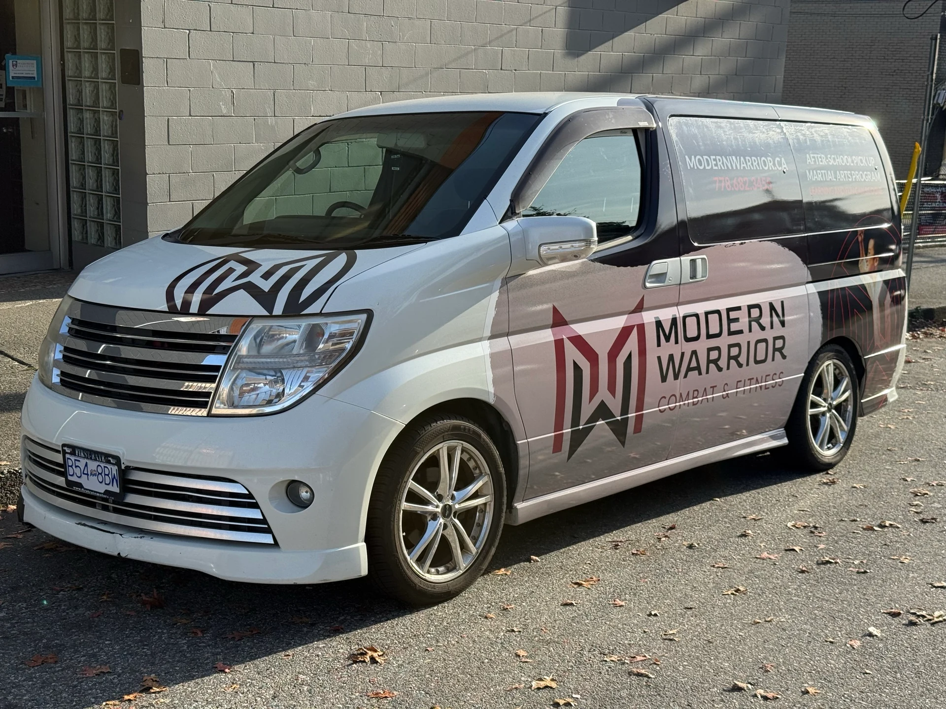 Front and side of the Modern Warrior after-school pickup van.